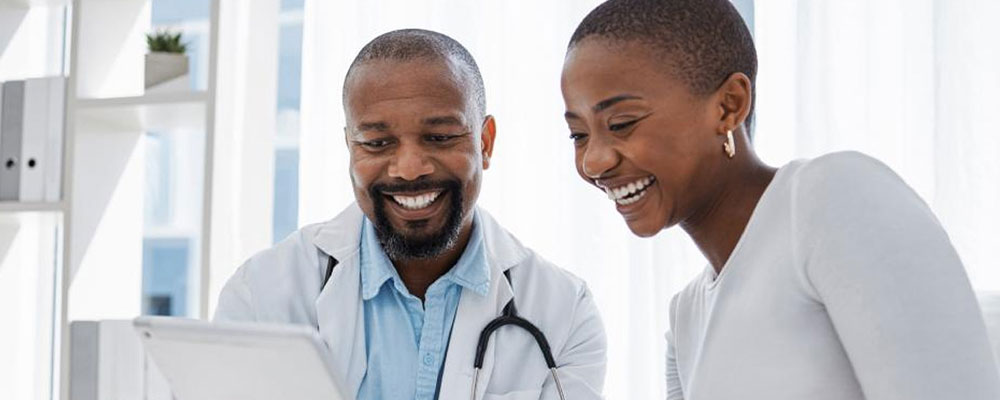 Doctor and patient reviewing results